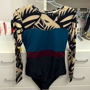 Seea long sleeve bathing suit. NWT never worn.